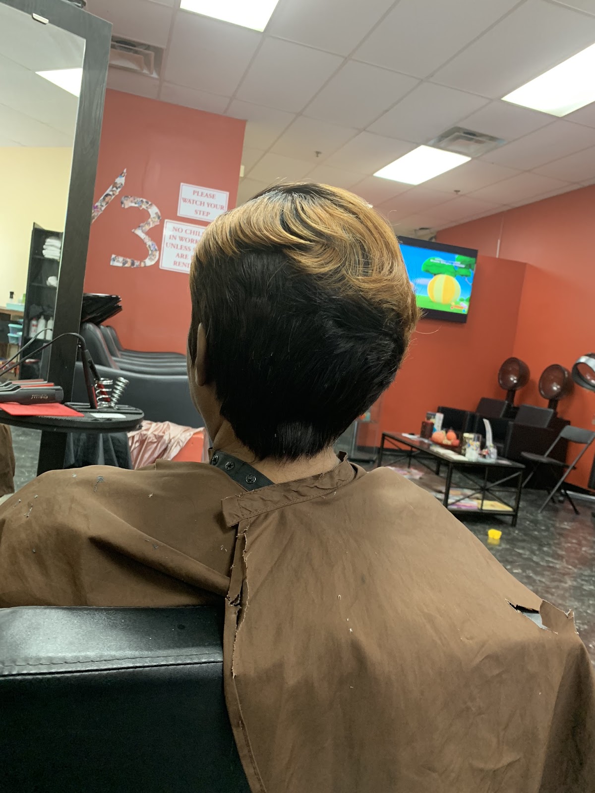 Tapered pixie quick weave finished inside Level 3 Salon